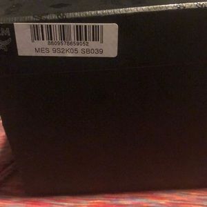 MCM silver and black slides